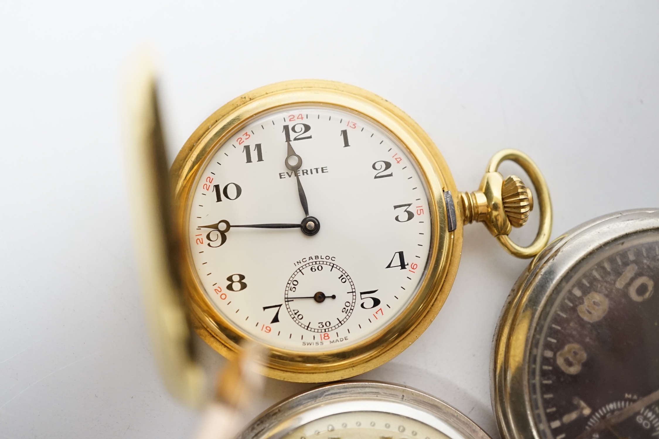 A silver open face pocket watch by Benson, London, an 800 standard hunter pocket watch by Havila and two others including a black dial Ingersoll Radiolite.